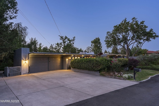 1405 Dartmouth Dr, Reno, NV 89509 - view of front of home with an attached garage and driveway