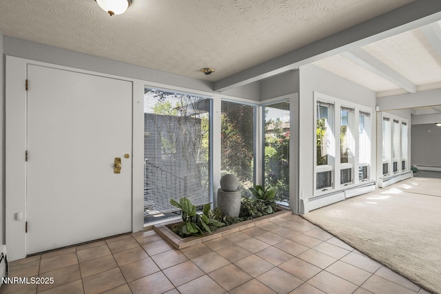 1405 Dartmouth Dr, Reno, NV 89509 - unfurnished sunroom with tile patterned flooring, plenty of natural light, baseboard heating, and a baseboard heating unit