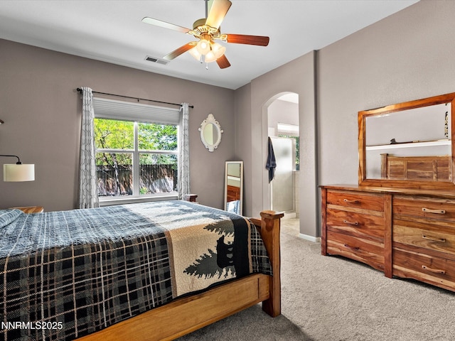 2814 S Fork Rd, Fernley, NV 89408 - bedroom featuring arched walkways, carpet flooring, ceiling fan, and baseboards