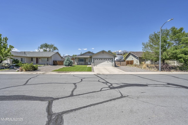 1416 Sally Ln, Gardnerville, NV 89460 - single story home with driveway, a garage, and a residential view