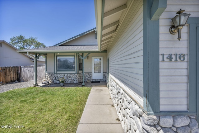 1416 Sally Ln, Gardnerville, NV 89460 - doorway to property featuring stone siding and roof with shingles