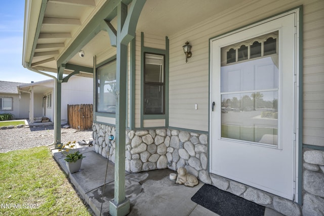 1416 Sally Ln, Gardnerville, NV 89460 - view of exterior entry featuring covered porch and stone siding