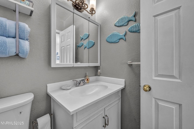 1416 Sally Ln, Gardnerville, NV 89460 - half bath with toilet, vanity, and a textured wall