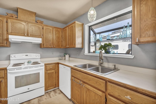 1416 Sally Ln, Gardnerville, NV 89460 - kitchen featuring white appliances, under cabinet range hood, a sink, light wood-type flooring, and light countertops