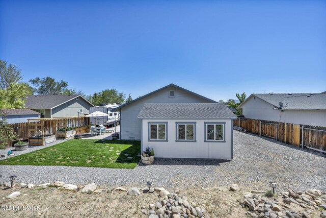 1416 Sally Ln, Gardnerville, NV 89460 - back of house featuring roof with shingles