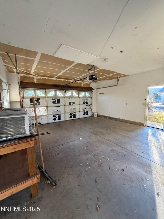 1416 Sally Ln, Gardnerville, NV 89460 - garage featuring a garage door opener