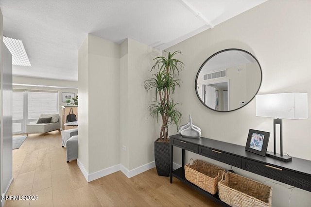 255 N Sierra St Unit 1410, Reno, NV 89501 - corridor featuring wood finished floors and baseboards