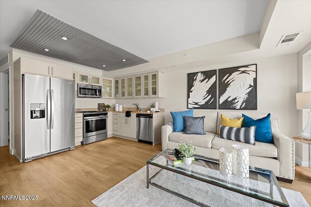 255 N Sierra St Unit 1410, Reno, NV 89501 - living room featuring light wood-type flooring