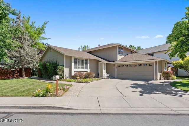 4492 Trenton Ct, Sparks, NV 89436 - view of front of home featuring a garage, concrete driveway, and a front lawn