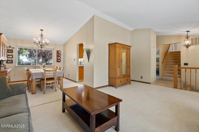 4492 Trenton Ct, Sparks, NV 89436 - living area with a chandelier, stairway, light carpet, and lofted ceiling