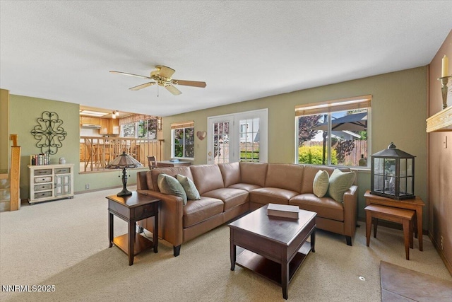 4492 Trenton Ct, Sparks, NV 89436 - living room featuring plenty of natural light, ceiling fan, light carpet, and a textured ceiling