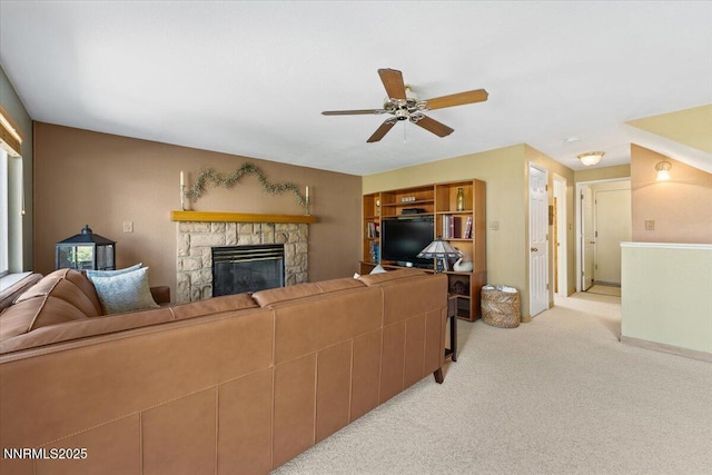 4492 Trenton Ct, Sparks, NV 89436 - living area with light carpet, ceiling fan, and a fireplace