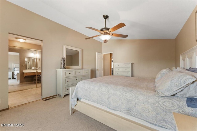 4492 Trenton Ct, Sparks, NV 89436 - bedroom featuring light colored carpet, ensuite bath, and ceiling fan