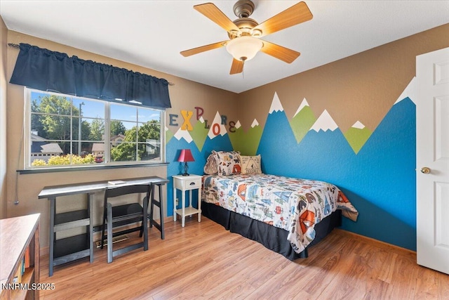 4492 Trenton Ct, Sparks, NV 89436 - bedroom featuring wood finished floors and a ceiling fan