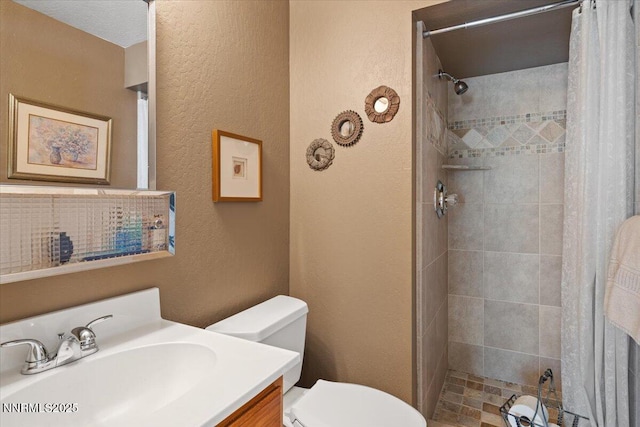4492 Trenton Ct, Sparks, NV 89436 - full bath featuring a textured wall, a tile shower, and vanity
