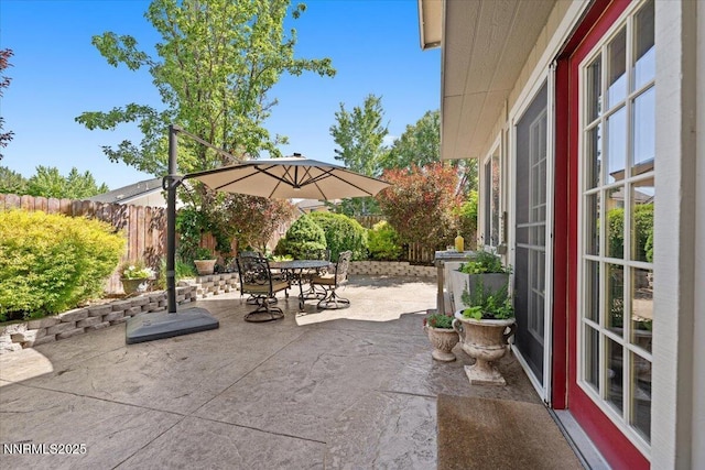 4492 Trenton Ct, Sparks, NV 89436 - fenced backyard with outdoor dining area and a patio area