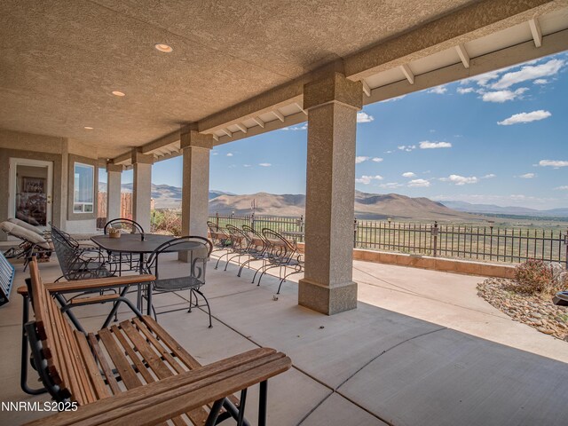 1037 Haystack Dr, Carson City, NV 89705 - view of patio / terrace featuring a mountain view and outdoor dining area