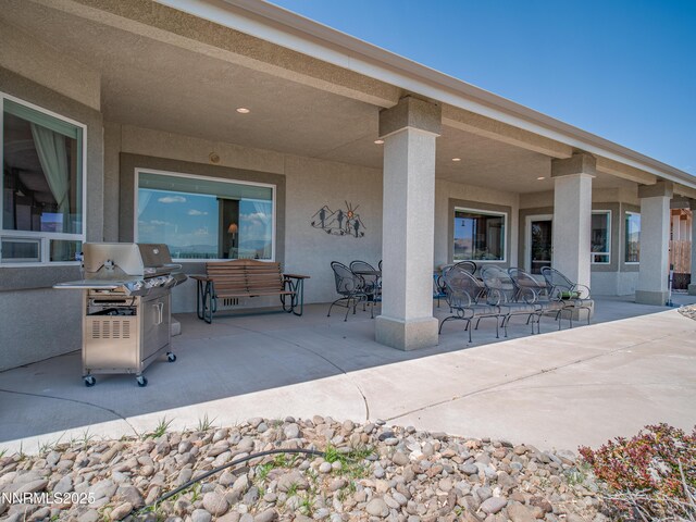1037 Haystack Dr, Carson City, NV 89705 - view of patio / terrace featuring a grill and outdoor dining area