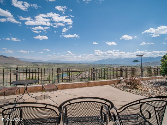 1037 Haystack Dr, Carson City, NV 89705 - view of patio featuring a mountain view and a rural view