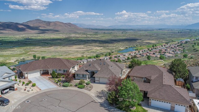 1037 Haystack Dr, Carson City, NV 89705 - aerial perspective of suburban area featuring a water and mountain view