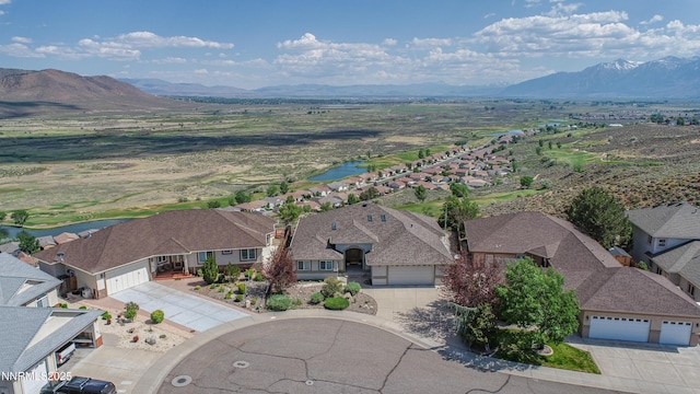 1037 Haystack Dr, Carson City, NV 89705 - aerial perspective of suburban area featuring a water and mountain view