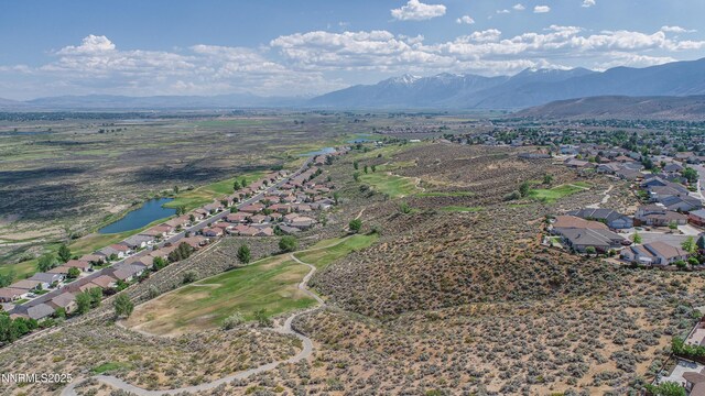 1037 Haystack Dr, Carson City, NV 89705 - aerial perspective of suburban area with a water and mountain view and a golf course