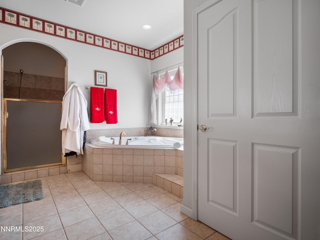 1037 Haystack Dr, Carson City, NV 89705 - bathroom with a bath, a stall shower, and tile patterned floors