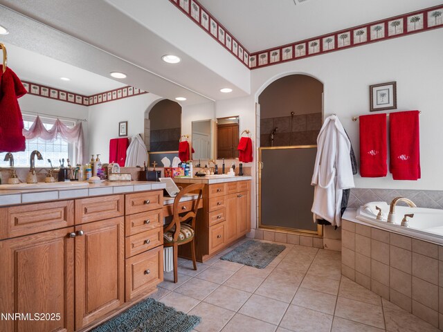 1037 Haystack Dr, Carson City, NV 89705 - bathroom with a shower stall, vanity, tile patterned flooring, a bath, and recessed lighting