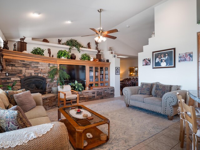 1037 Haystack Dr, Carson City, NV 89705 - living area featuring a ceiling fan, a fireplace, and lofted ceiling