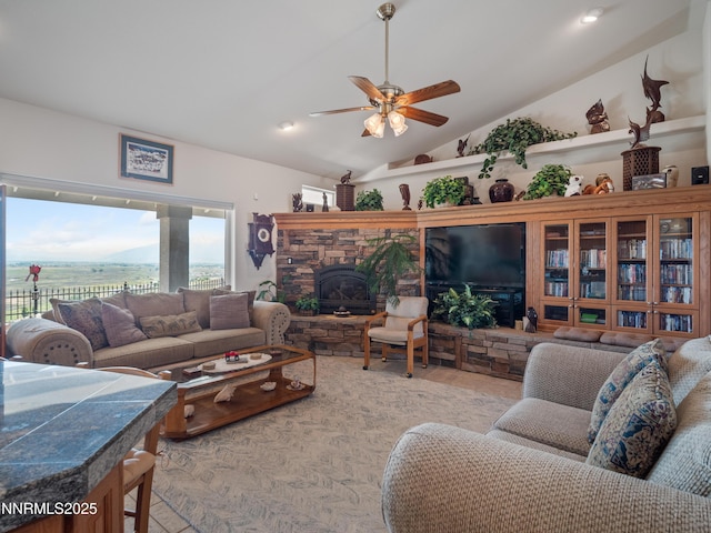 1037 Haystack Dr, Carson City, NV 89705 - living area featuring vaulted ceiling, a fireplace, and a ceiling fan