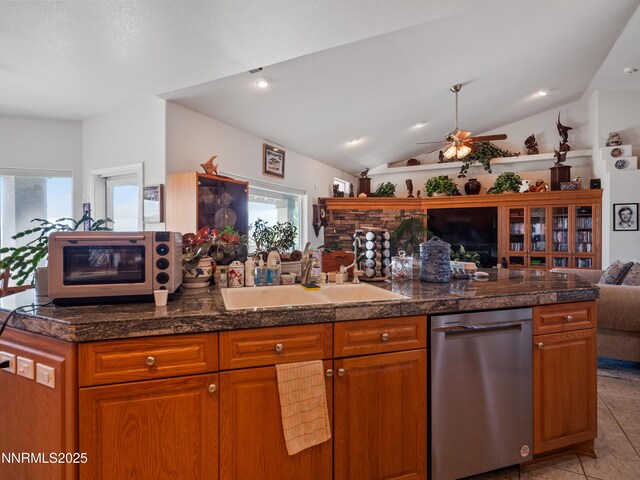 1037 Haystack Dr, Carson City, NV 89705 - kitchen featuring dishwasher, open floor plan, a sink, healthy amount of natural light, and vaulted ceiling
