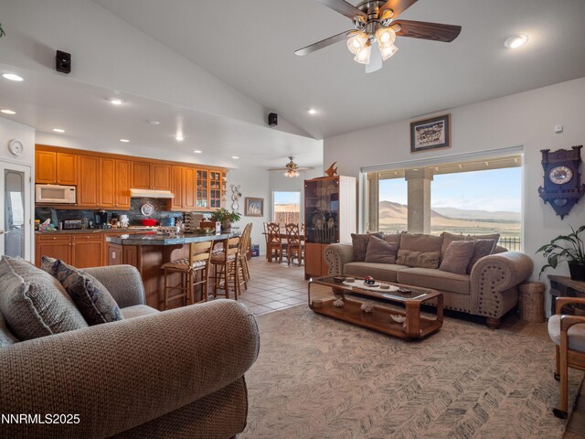 1037 Haystack Dr, Carson City, NV 89705 - living area with ceiling fan, recessed lighting, lofted ceiling, and light tile patterned floors