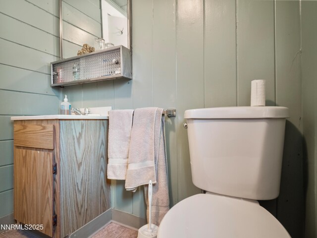 3790 Stewart Way S, Lake Tahoe, CA 96150 - bathroom with toilet, vanity, and a decorative wall