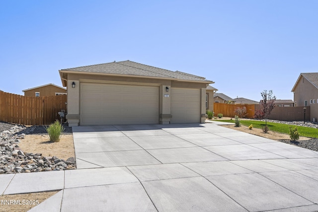 910 Cranfield Ct, Reno, NV 89506 - view of front of property featuring driveway, a garage, and stucco siding
