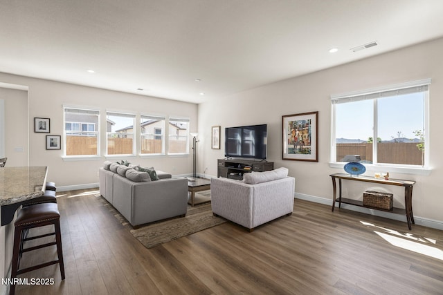 910 Cranfield Ct, Reno, NV 89506 - living area with dark wood-type flooring, baseboards, and recessed lighting