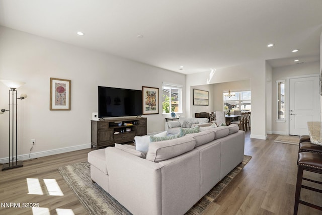 910 Cranfield Ct, Reno, NV 89506 - living room featuring light wood-type flooring, baseboards, and recessed lighting