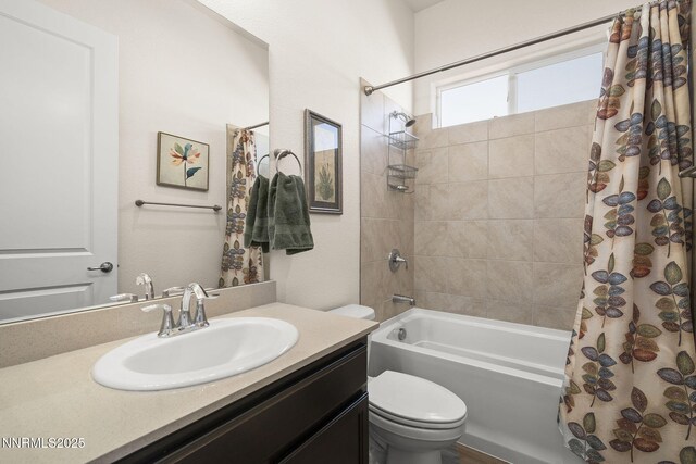 910 Cranfield Ct, Reno, NV 89506 - bathroom featuring toilet, shower / bath combo with shower curtain, and vanity