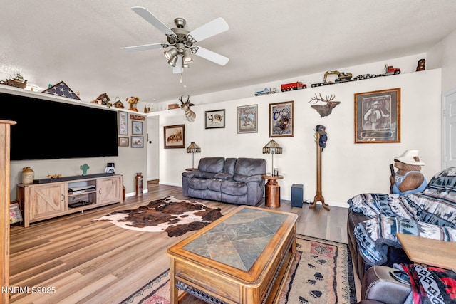 17533 Javalina Ct, Reno, NV 89508 - living room featuring ceiling fan, wood finished floors, and baseboards