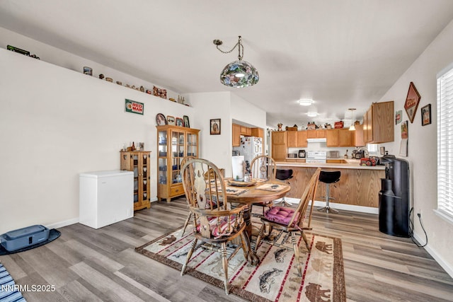 17533 Javalina Ct, Reno, NV 89508 - dining room featuring light wood-style floors and baseboards