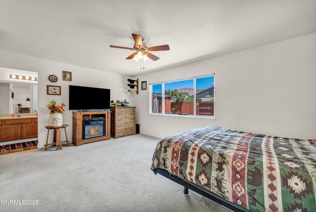 17533 Javalina Ct, Reno, NV 89508 - bedroom featuring carpet, connected bathroom, and a ceiling fan