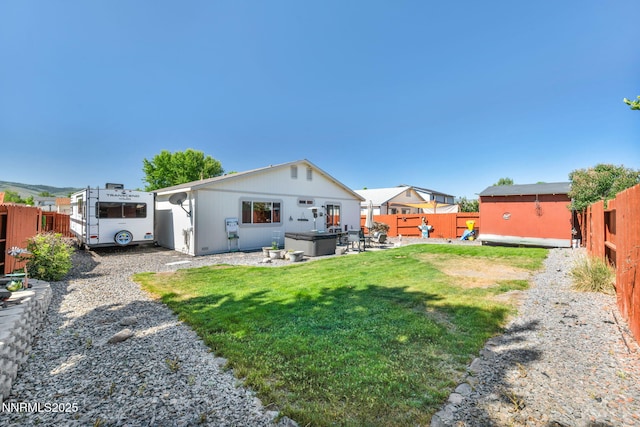 17533 Javalina Ct, Reno, NV 89508 - back of house featuring a hot tub and a patio area