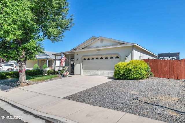 17533 Javalina Ct, Reno, NV 89508 - ranch-style home with an attached garage, concrete driveway, and stucco siding