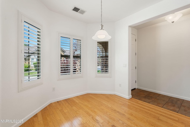 469 N Sand Crane Cir, Sparks, NV 89436 - spare room with healthy amount of natural light, baseboards, and wood finished floors