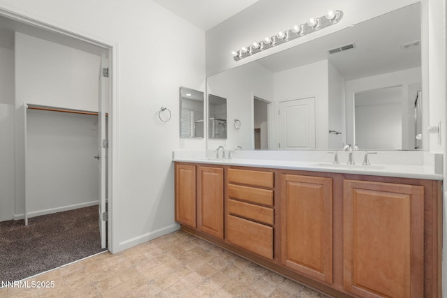 469 N Sand Crane Cir, Sparks, NV 89436 - bathroom featuring double vanity and baseboards