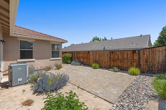469 N Sand Crane Cir, Sparks, NV 89436 - fenced backyard with a patio and central air condition unit