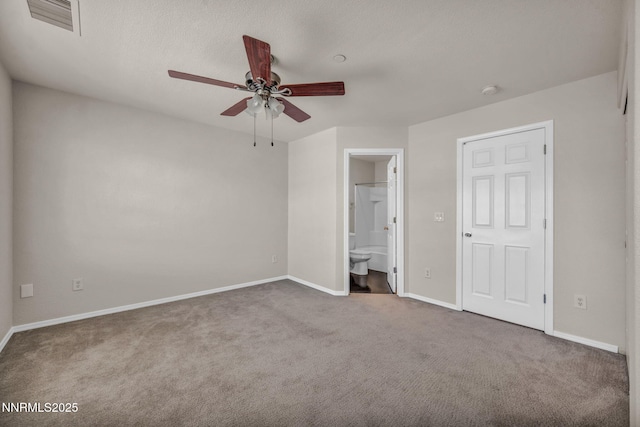 3074 Sterling Ridge Cir, Sparks, NV 89431 - unfurnished bedroom featuring carpet floors, connected bathroom, and a ceiling fan