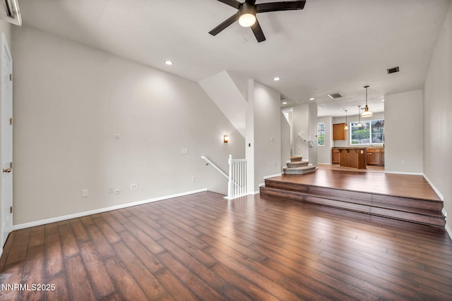 3074 Sterling Ridge Cir, Sparks, NV 89431 - unfurnished living room featuring a ceiling fan, wood finished floors, recessed lighting, and stairway