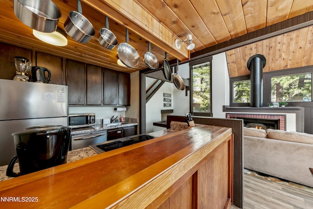 340 Quaking Aspen Ln # C, Stateline, NV 89449 - kitchen with stainless steel appliances, wooden ceiling, healthy amount of natural light, and a sink