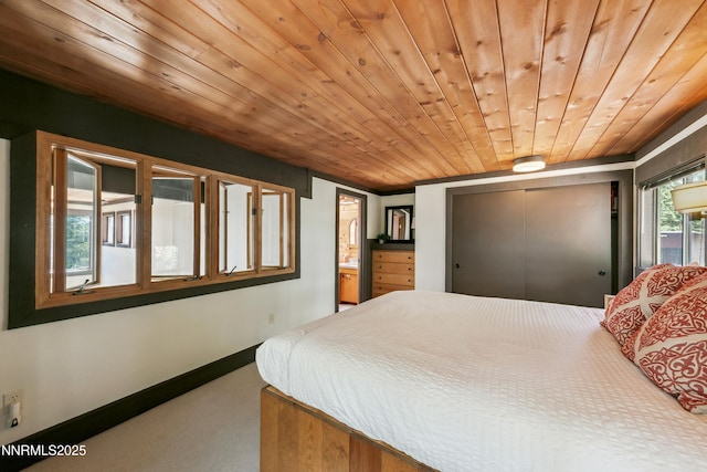 340 Quaking Aspen Ln # C, Stateline, NV 89449 - bedroom featuring carpet floors, wooden ceiling, a closet, and baseboards