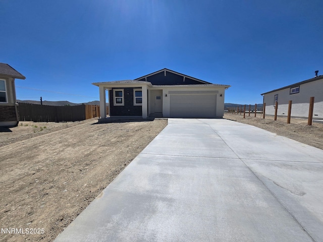 4048 Cold Spgs, Reno, NV 89508 - ranch-style house with concrete driveway and a garage